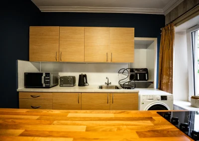 Fully equipped kitchen at Thorshaven Apartment with microwave, kettle and toaster